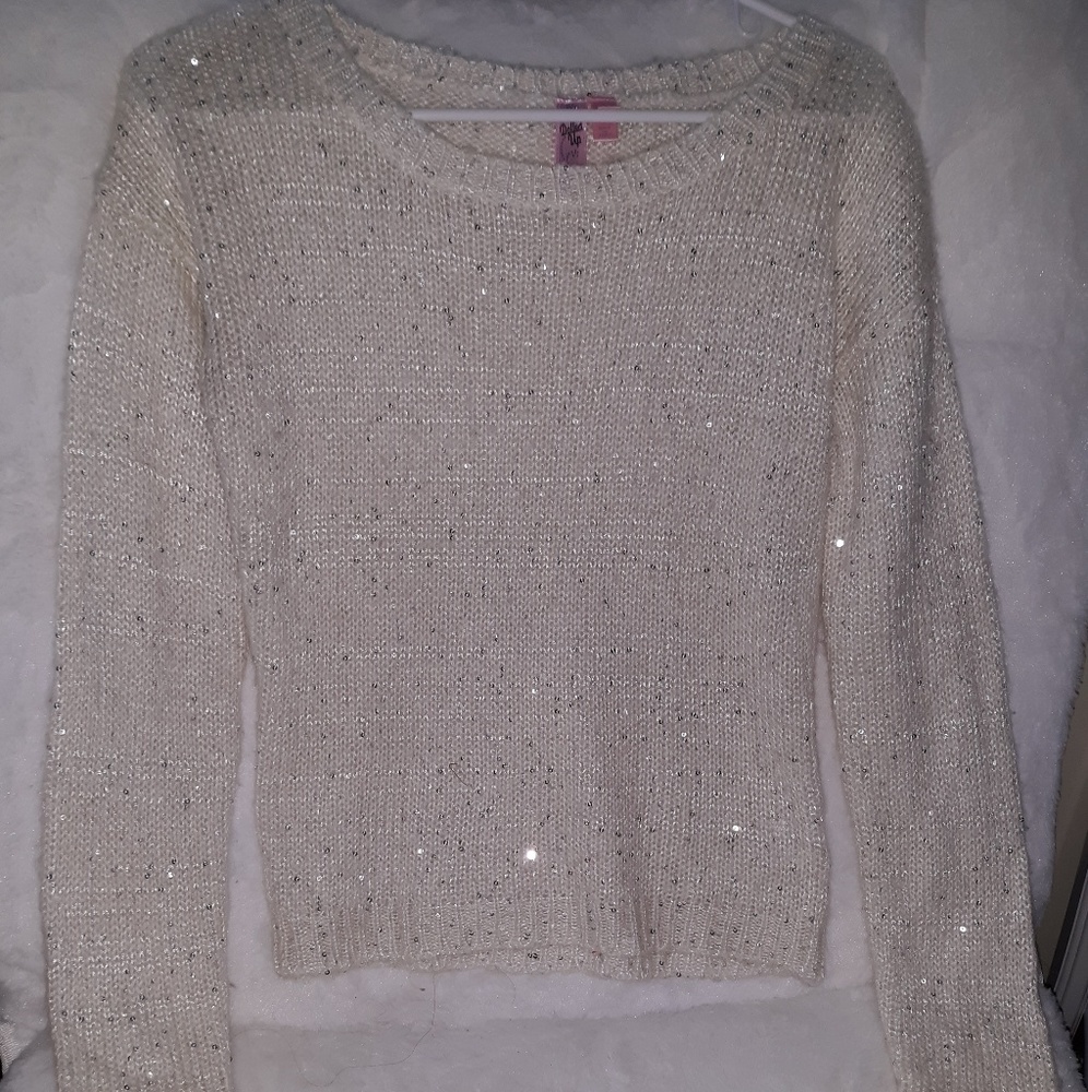 white sparkly sweater
